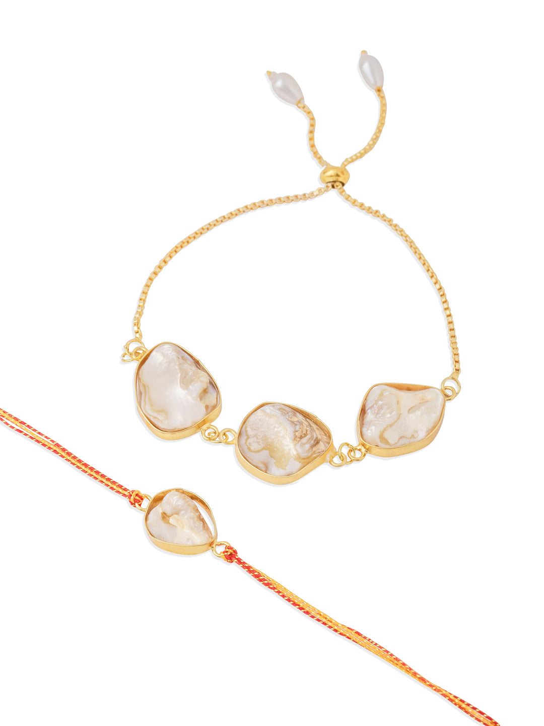 NVR Set of 2 Gold Toned Pearls Bhaiya Bhabhi Rakhi with Roli Chawal Chandan & Mishri | Grocsy