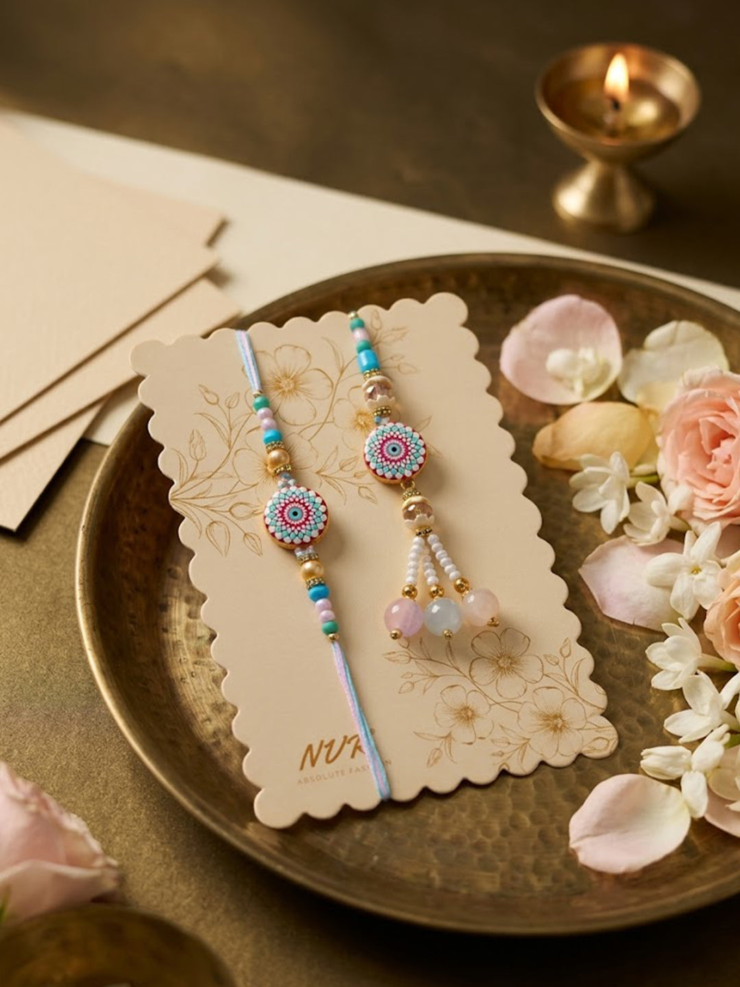 NVR Set of 2 Floral Design Bhaiya Bhabhi Rakhi with Roli Chawal Chandan Mishri | Grocsy