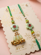 NVR Set of 2 Flower Shape Artificial Stones & Beads Bhaiya Bhabhi Rakhi With Roli Chawal | Grocsy