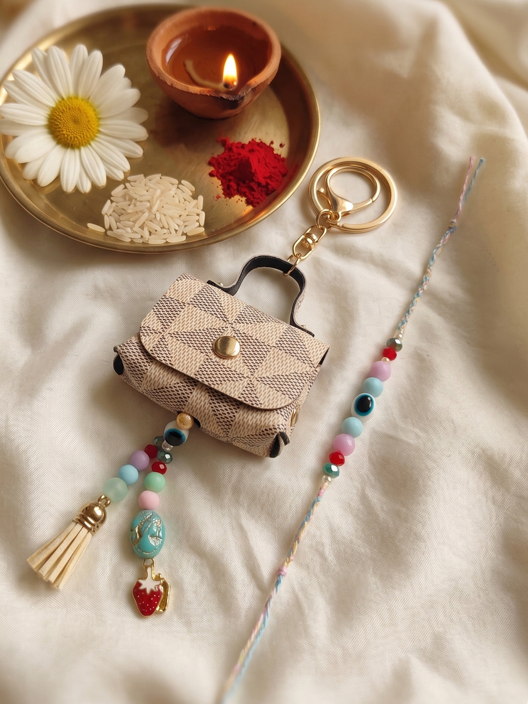 NVR Set of 2 Purse Design Evil Eye & Beads Bhaiya Bhabhi Rakhi With Roli Chawal | Grocsy