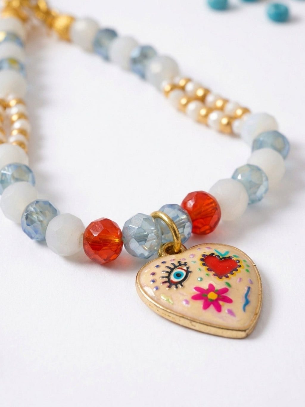 NVR Set of 2 Evil Eye Beaded Gold Toned Bhaiya Bhabhi Rakhi With Roli Chawal Chandan | Grocsy