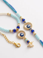 NVR Set of 2 Blue Evil Eye Gold Toned Beaded Bhaiya Bhabhi Rakhi with Roli Chawal Chandan | Grocsy
