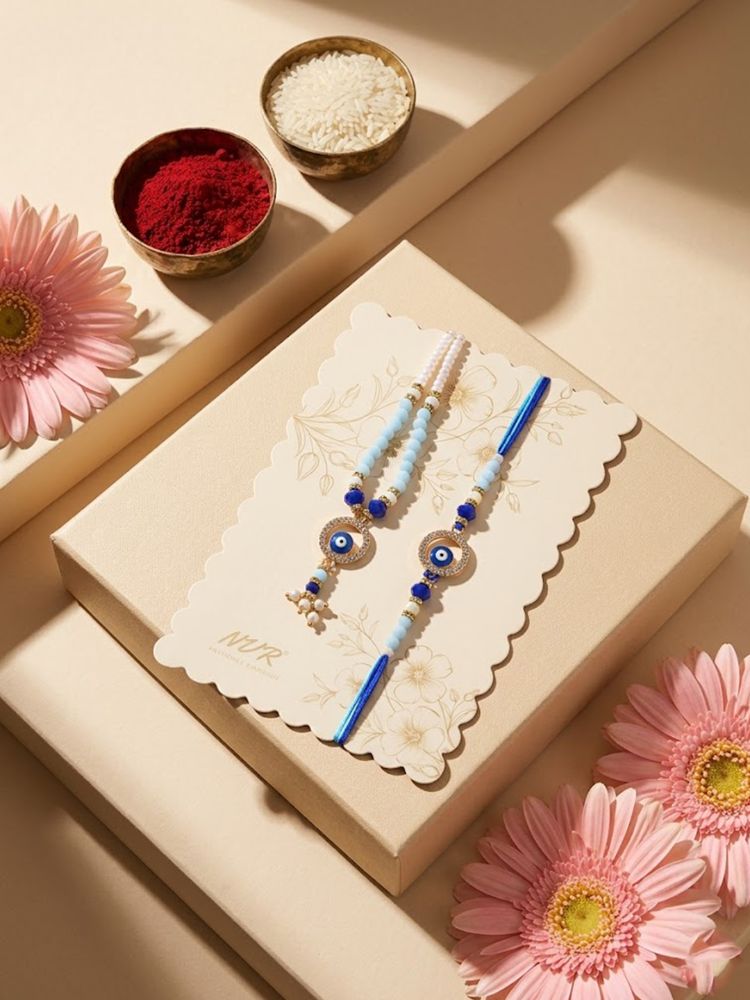 NVR Set of 2 Blue Evil Eye Gold Toned Beaded Bhaiya Bhabhi Rakhi with Roli Chawal Chandan | Grocsy