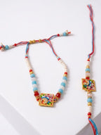 NVR Set of 2 Multicolor Artificial Beads Bhaiya Bhabhi Rakhi With Roli Chawal Chandan | Grocsy