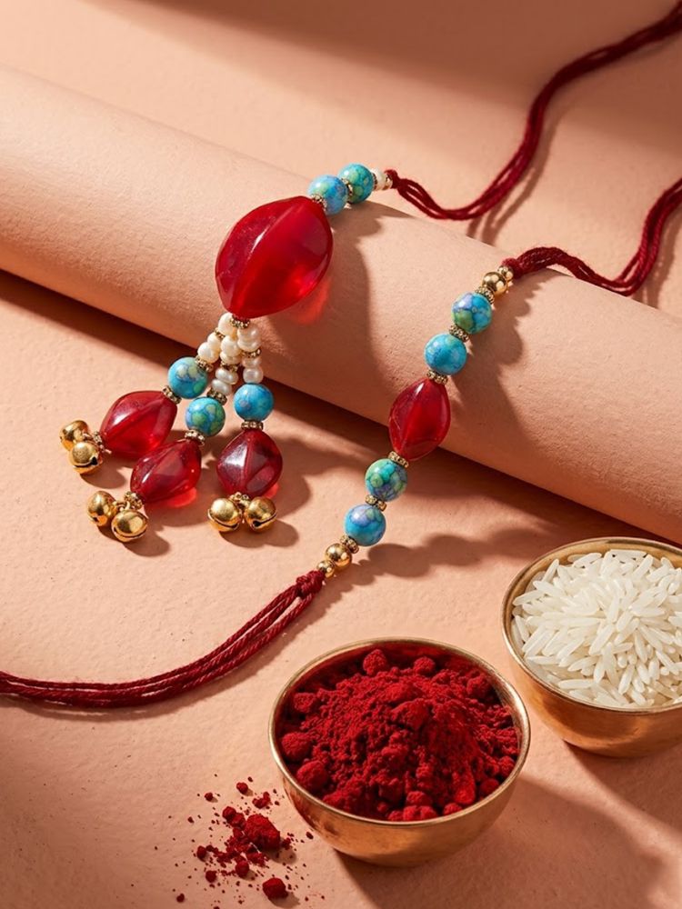 NVR Set of 2 Artificial Beads & Gold Toned Ghungroo Bhaiya Bhabhi Rakhi with Roli Chawal | Grocsy