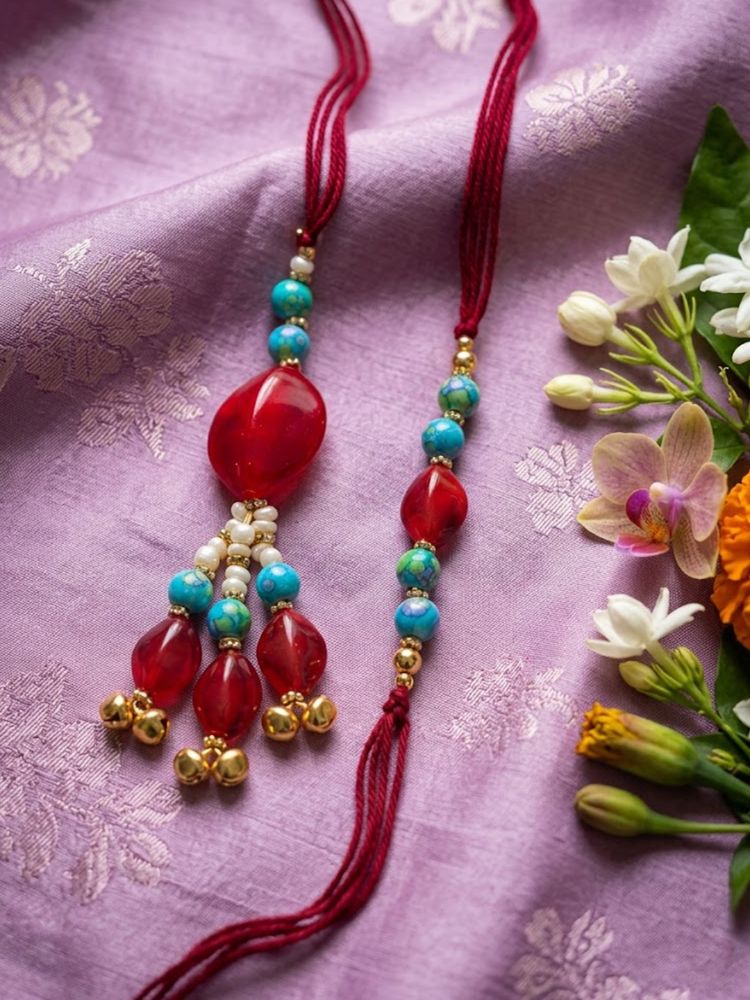 NVR Set of 2 Artificial Beads & Gold Toned Ghungroo Bhaiya Bhabhi Rakhi with Roli Chawal | Grocsy
