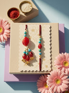 NVR Set of 2 Artificial Beads & Gold Toned Ghungroo Bhaiya Bhabhi Rakhi with Roli Chawal | Grocsy