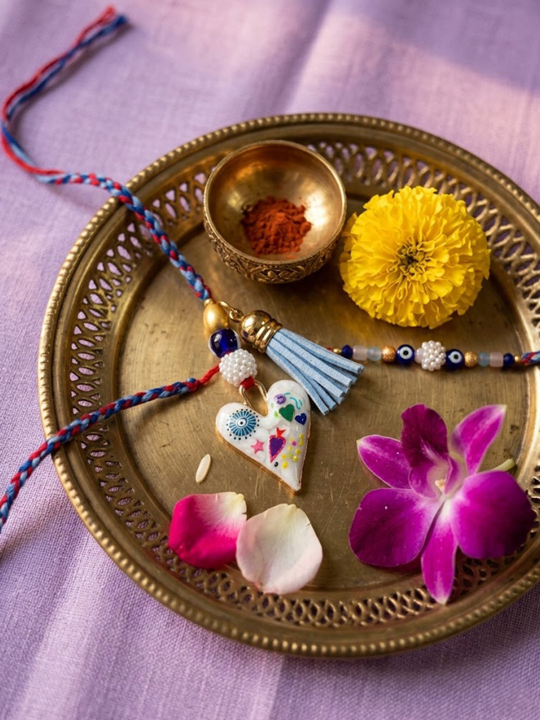 NVR Set of 2 Evil Eye Beaded Heart Shape Bhaiya Bhabhi Rakhi with Roli Chawal Chandan | Grocsy