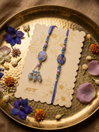 NVR Set of 2 Purple Artificial Beads Traditional Bhaiya Bhabhi Rakhi with Roli Chawal | Grocsy