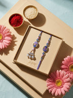 NVR Set of 2 Purple Artificial Beads Traditional Bhaiya Bhabhi Rakhi with Roli Chawal | Grocsy