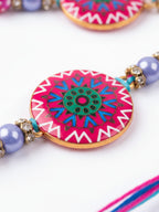 NVR Set of 2 Artificial Stones & Beads Floral Design Bhaiya Bhabhi Rakhi with Roli Chawal | Grocsy