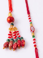 NVR Set of 2 Designer Red Artificial Beads Bhaiya Bhabhi Rakhi with Roli Chawal Chandan | Grocsy