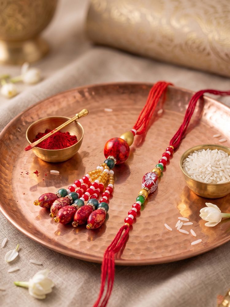 NVR Set of 2 Designer Red Artificial Beads Bhaiya Bhabhi Rakhi with Roli Chawal Chandan | Grocsy