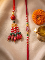 NVR Set of 2 Designer Red Artificial Beads Bhaiya Bhabhi Rakhi with Roli Chawal Chandan | Grocsy