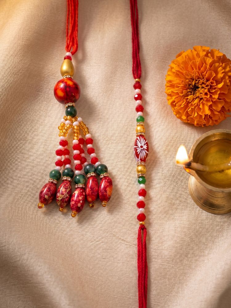 NVR Set of 2 Designer Red Artificial Beads Bhaiya Bhabhi Rakhi with Roli Chawal Chandan | Grocsy
