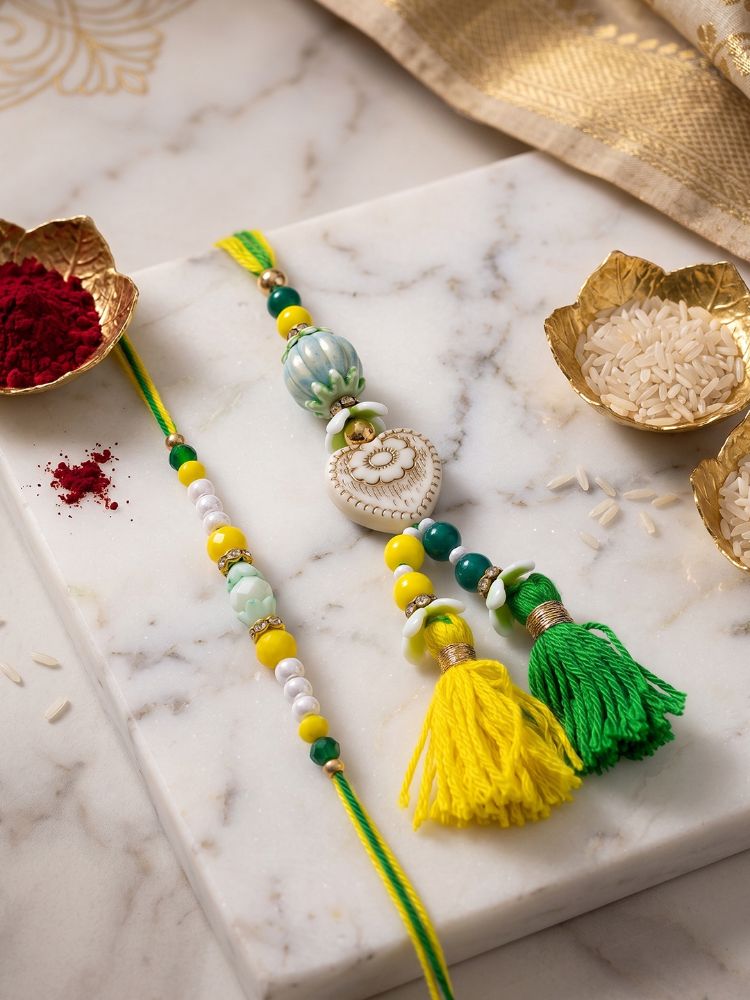 NVR Set of 2 Green & Yellow Beaded Heart Shape Bhaiya Bhabhi Rakhi with Roli Chawal | Grocsy