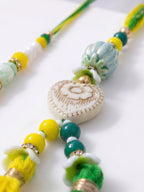 NVR Set of 2 Green & Yellow Beaded Heart Shape Bhaiya Bhabhi Rakhi with Roli Chawal | Grocsy