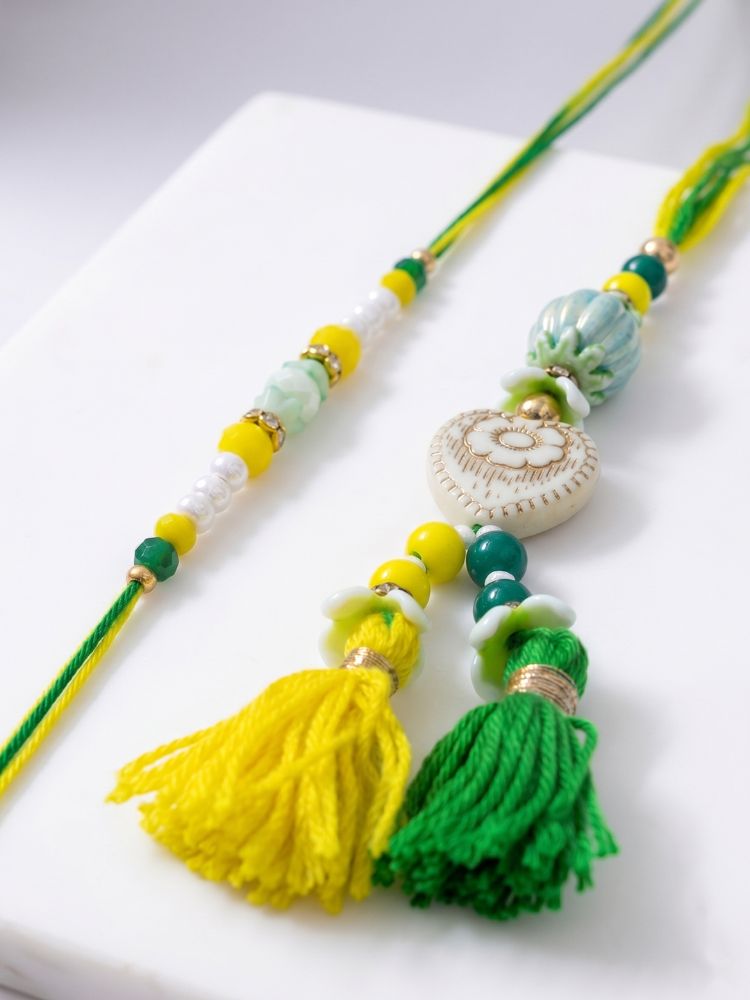 NVR Set of 2 Green & Yellow Beaded Heart Shape Bhaiya Bhabhi Rakhi with Roli Chawal | Grocsy