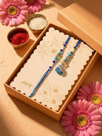 NVR Set of 2 Blue Artificial Beads Jhumka Design Bhaiya Bhabhi Rakhi with Roli Chawal | Grocsy
