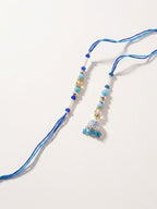 NVR Set of 2 Blue Artificial Beads Jhumka Design Bhaiya Bhabhi Rakhi with Roli Chawal | Grocsy