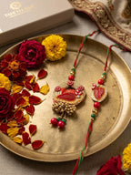 NVR Set of 2 Artificial Beads Bhaiya Bhabhi Rakhi with Roli Chawal Chandan Mishri | Grocsy