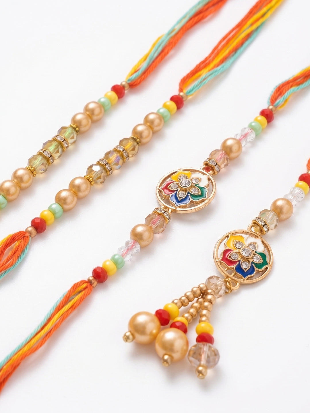 NVR Set of 4 Artificial Beads Family Pack Thread Rakhi with Roli Chawal Chandan Mishri | Grocsy