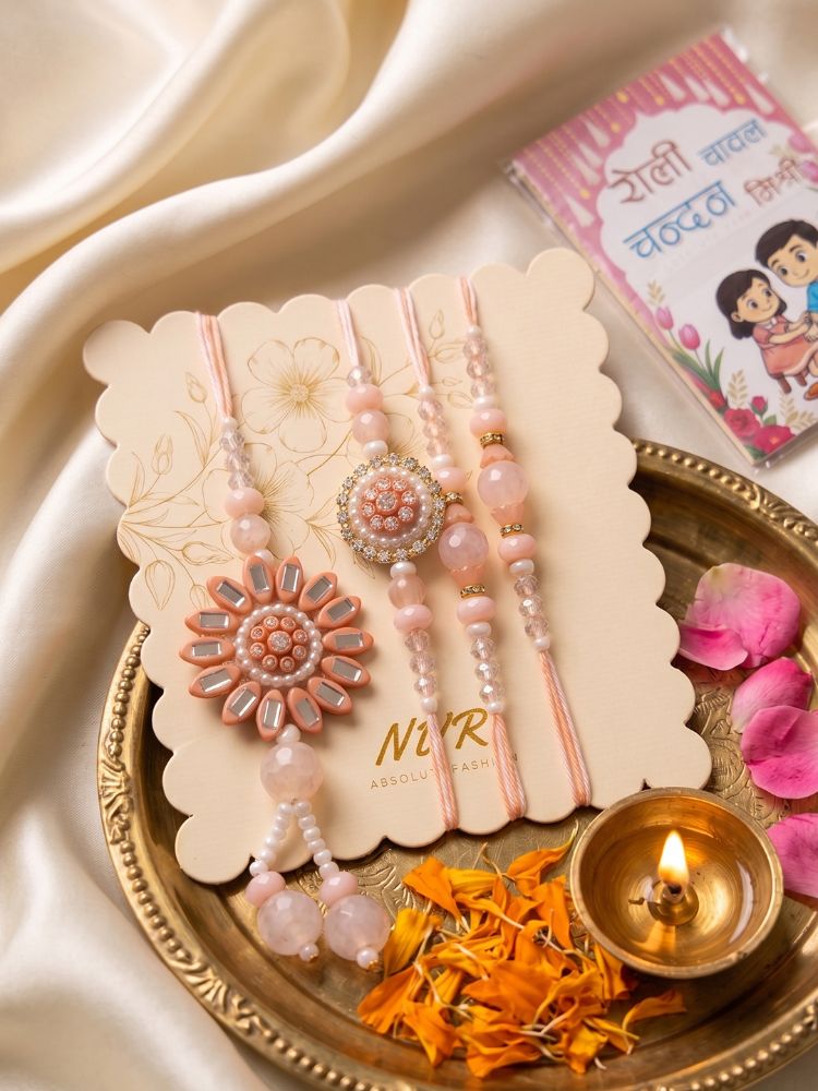 NVR Set of 4 Beaded Family Pack Thread Rakhi with Roli Chawal Chandan Mishri | Grocsy