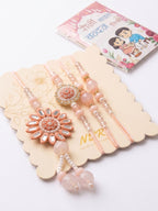 NVR Set of 4 Beaded Family Pack Thread Rakhi with Roli Chawal Chandan Mishri | Grocsy