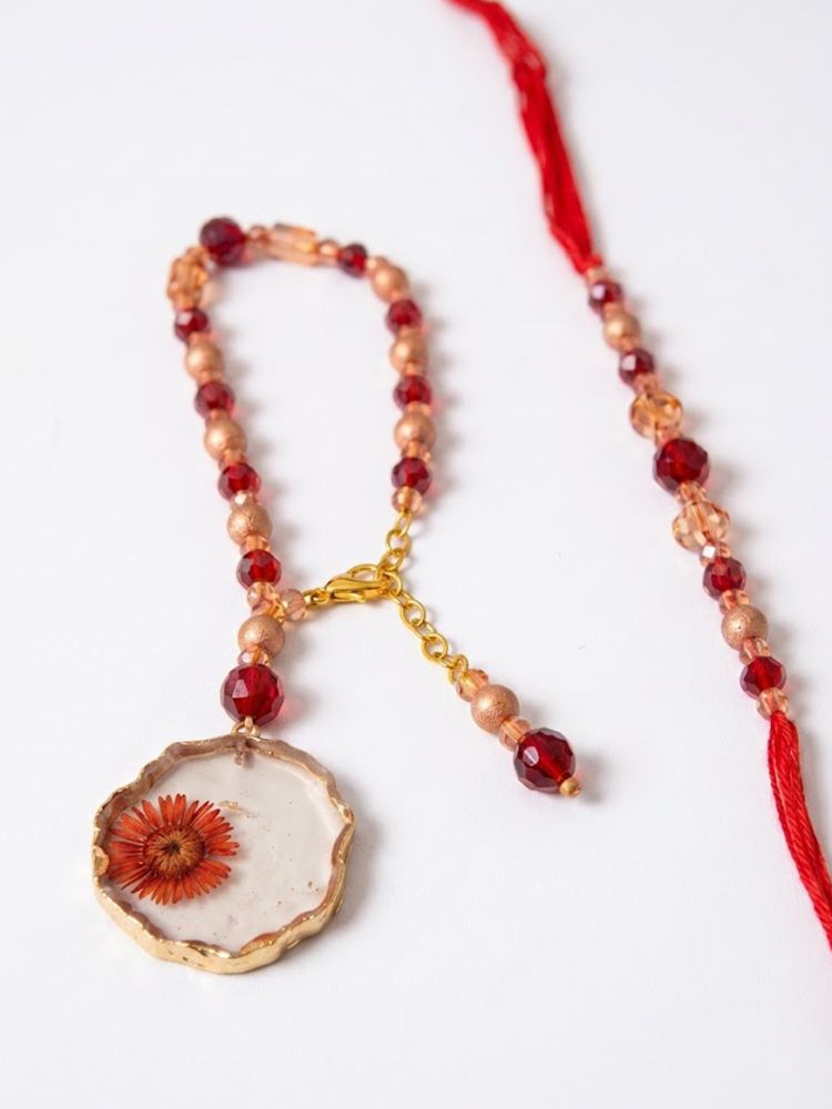 NVR Set of 2 Gold Toned Red Artificial Beads Bhaiya Bhabhi Rakhi With Roli Chawal Chandan | Grocsy
