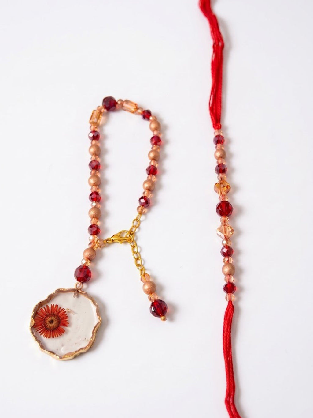 NVR Set of 2 Gold Toned Red Artificial Beads Bhaiya Bhabhi Rakhi With Roli Chawal Chandan | Grocsy