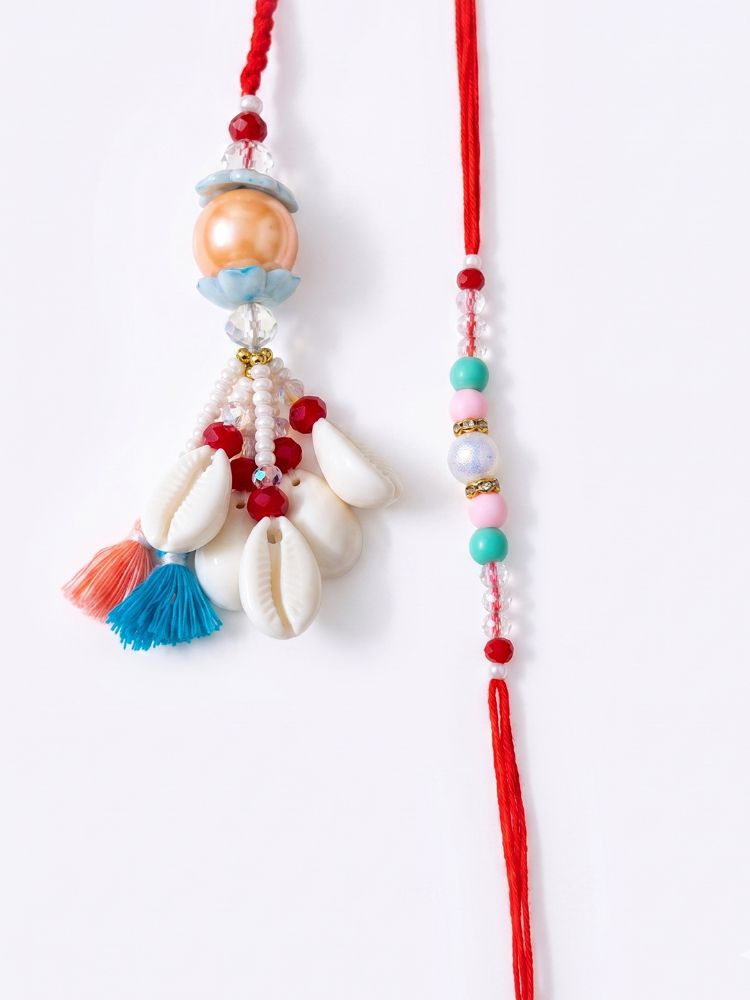 NVR Set of 2 Multicolor Artificial Beads & Sea Shell Bhaiya Bhabhi Rakhi with Roli Chawal | Grocsy