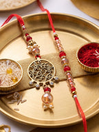 NVR Set of 2 Gold Toned Artificial Stones & Beads Bhaiya Bhabhi Rakhi with Roli Chawal | Grocsy