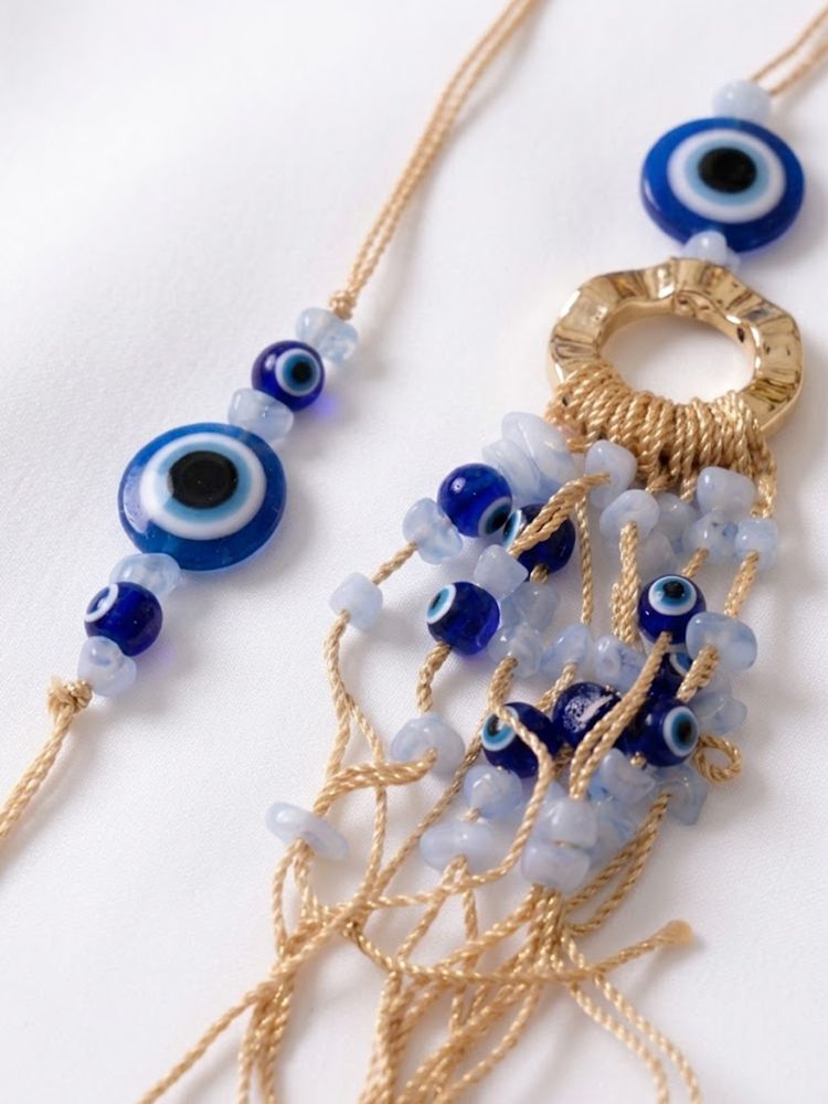 NVR Set of 2 Gold Toned Round Evil Eye Bhaiya Bhabhi Rakhi with Roli Chawal Chandan Mishri | Grocsy