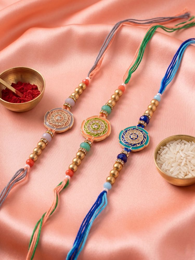 NVR Set of 3 Floral Design Multicolor Artificial Beads Thread Rakhi With Roli Chawal | Grocsy