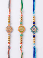 NVR Set of 3 Floral Design Multicolor Artificial Beads Thread Rakhi With Roli Chawal | Grocsy