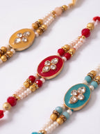 NVR Set of 3 Multicolor Artificial Beads & White Pearls Thread Rakhi with Roli Chawal | Grocsy