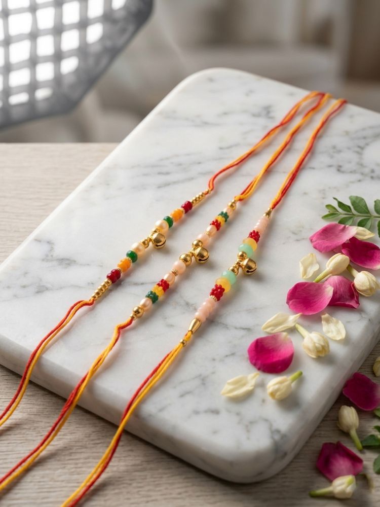 NVR Set of 3 Artificial Beads Orange Thread Rakhi With Roli Chawal Chandan Mishri | Grocsy