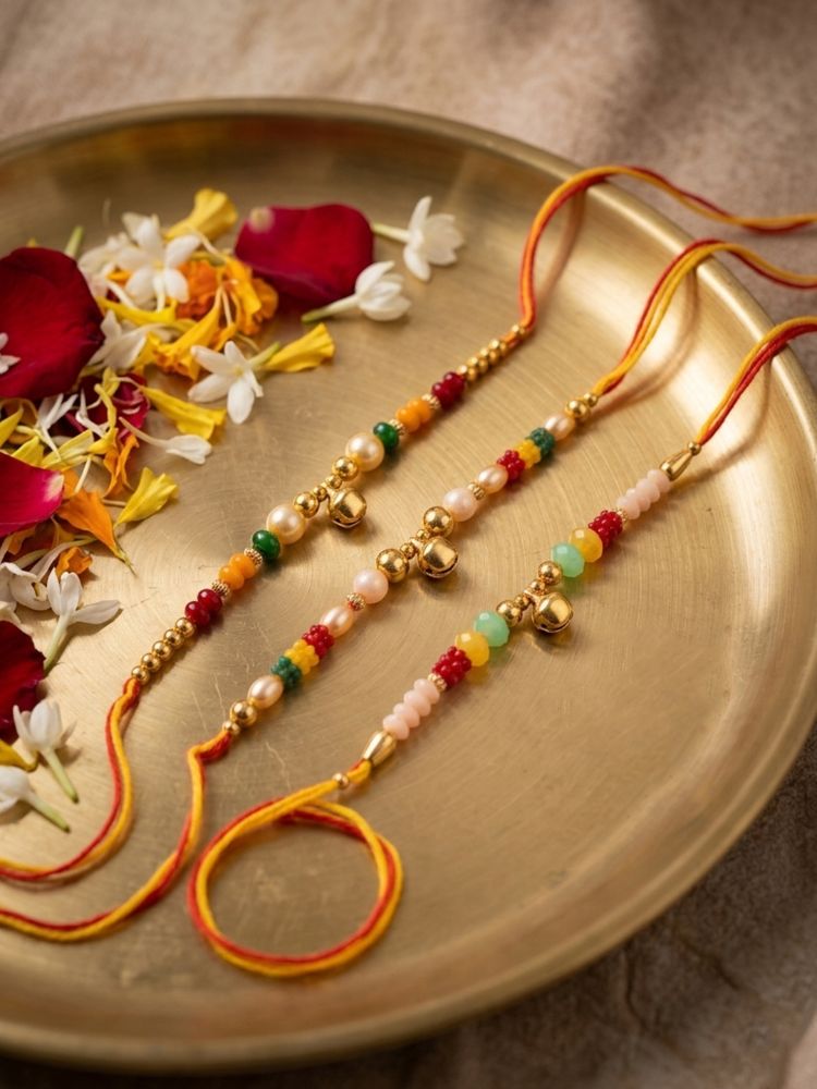 NVR Set of 3 Artificial Beads Orange Thread Rakhi With Roli Chawal Chandan Mishri | Grocsy
