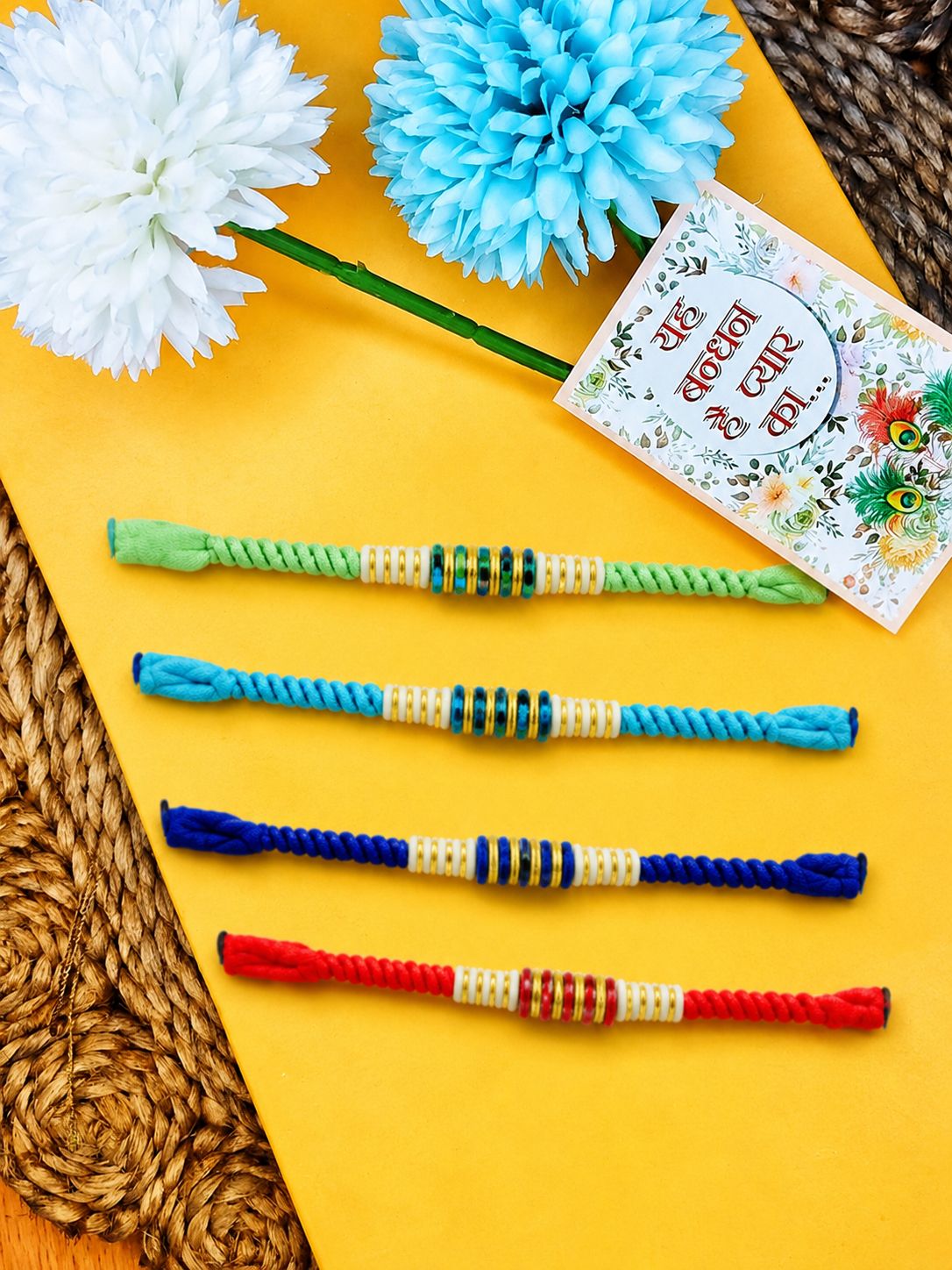 NVR Set of 4 Multicolor Artificial Beads Thread Rakhi with Roli Chawal Chandan Mishri | Grocsy