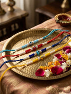 NVR Set of 4 Multicolor Evil Eye Thread Rakhi with Roli Chawal Chandan Mishri | Grocsy