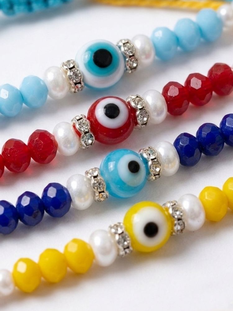 NVR Set of 4 Multicolor Evil Eye Thread Rakhi with Roli Chawal Chandan Mishri | Grocsy