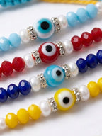 NVR Set of 4 Multicolor Evil Eye Thread Rakhi with Roli Chawal Chandan Mishri | Grocsy