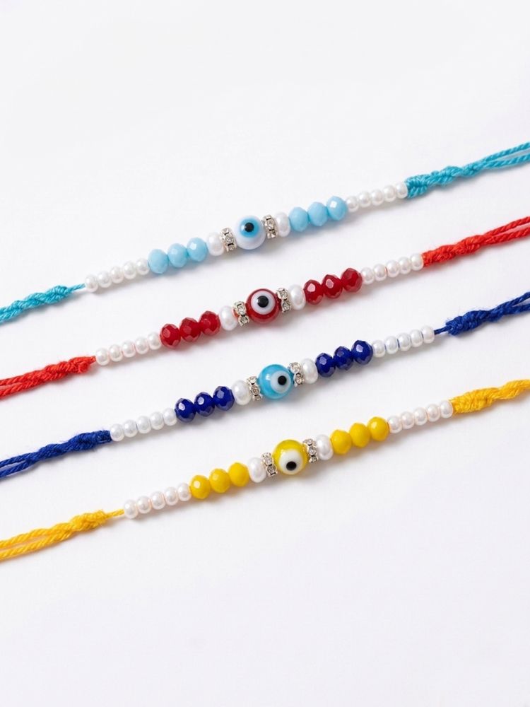 NVR Set of 4 Multicolor Evil Eye Thread Rakhi with Roli Chawal Chandan Mishri | Grocsy