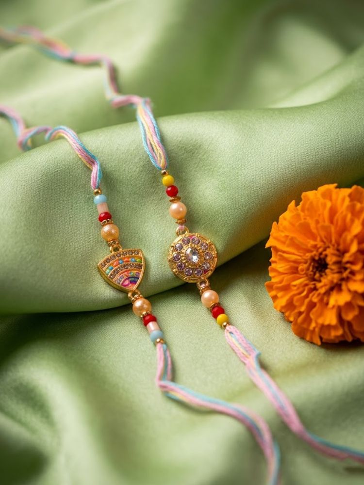 NVR Set of 2 Gold Toned Artificial Stones & Beads Thread Rakhi with Roli Chawal Chandan | Grocsy