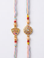 NVR Set of 2 Gold Toned Artificial Stones & Beads Thread Rakhi with Roli Chawal Chandan | Grocsy