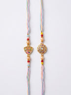 NVR Set of 2 Gold Toned Artificial Stones & Beads Thread Rakhi with Roli Chawal Chandan | Grocsy
