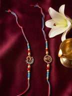 NVR Set of 2 Multicolor Artificial Beads Thread Rakhi with Roli Chawal Chandan Mishri | Grocsy