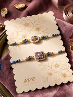 NVR Set of 2 White Pearls Thread Rakhi with Roli Chawal Chandan Mishri | Grocsy