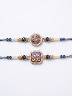 NVR Set of 2 White Pearls Thread Rakhi with Roli Chawal Chandan Mishri | Grocsy