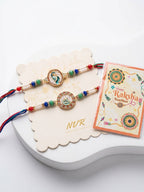 NVR Set of 2 Multicolor Peacock Design Rakhi with Roli Chawal Chandan Mishri | Grocsy